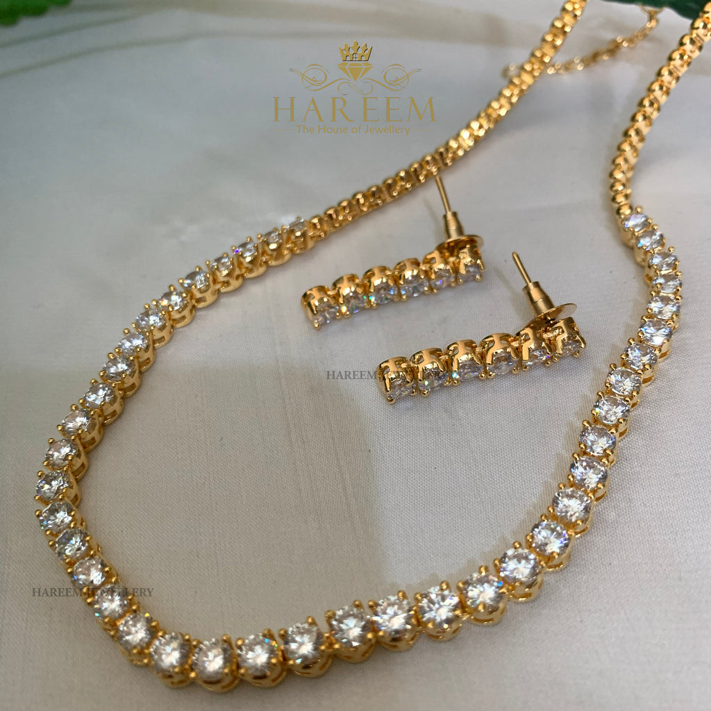american diamond solitare jewelry set in gold platting by hareem Jewellery house 