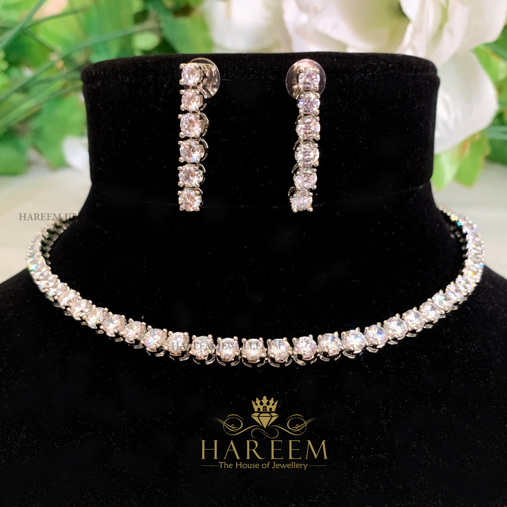 american diamond solitare set in silver platting by hareem Jewellery house 